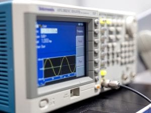 Oscilloscope lab item on the table, a photo with a small depth o